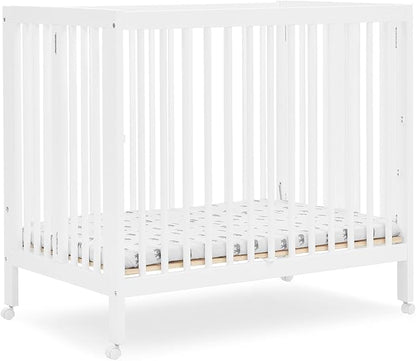Delta Children Mia Portable Folding Mini Crib with 1.5-Inch Mattress - Greenguard Gold Certified, Bianca White