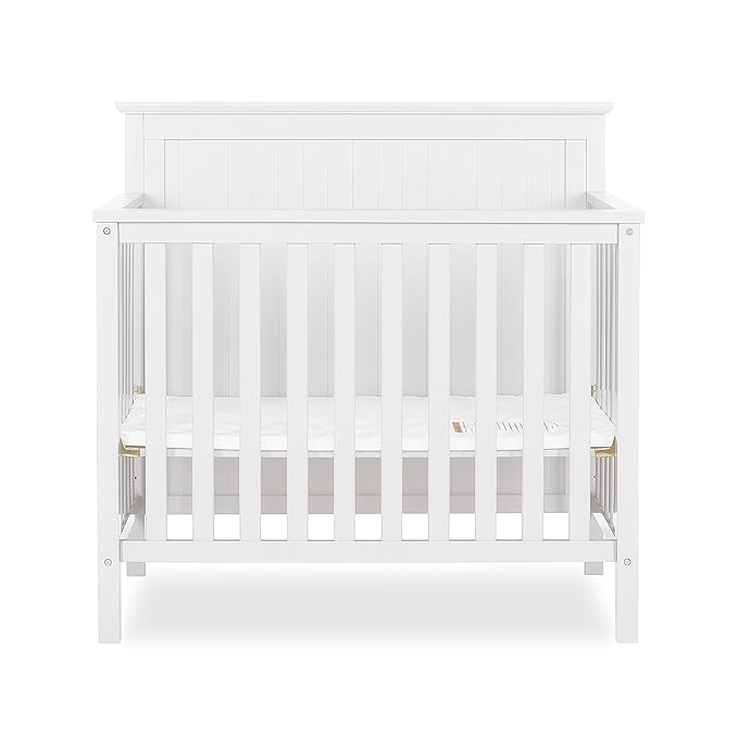 Ava 4-in-1 Convertible Mini Crib in White, Greenguard Gold Certified, Non-Toxic Finish, Comes with 1" Mattress Pad, with 3 Mattress Height Settings