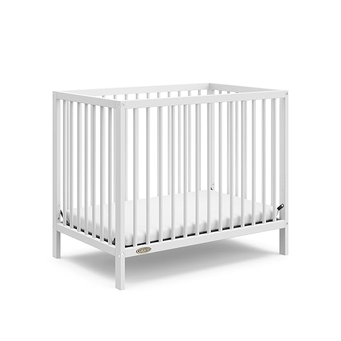 Graco Teddi 4-in-1 Convertible Mini Crib with Bonus Water-Resistant Mattress (White) – GREENGUARD Gold Certified, 2.75-Inch Mattress Included, Convenient Size, Easy 30-Minute Assembly