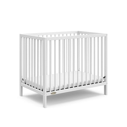 Graco Teddi 4-in-1 Convertible Mini Crib with Bonus Water-Resistant Mattress (White) – GREENGUARD Gold Certified, 2.75-Inch Mattress Included, Convenient Size, Easy 30-Minute Assembly