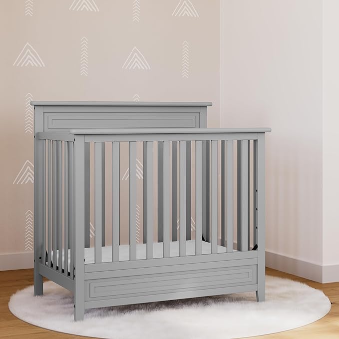 STORKCRAFT Petal 4-in-1 Convertible Mini Crib (Pebble Gray) – GREENGUARD Gold Certified, Converts to Daybed and Twin-Size Bed, Includes Bonus 2.75-inch Mini Crib Mattress