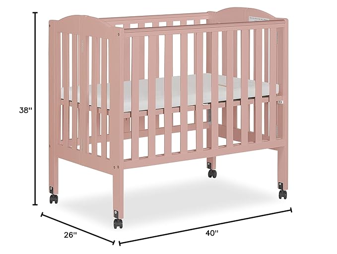 2-in-1 Portable Folding Stationary Side Crib in Dusty Pink, Greenguard Gold Certified, Two Adjustable Mattress Height Positions,Made of Solid Pinewood, Flat Folding Crib