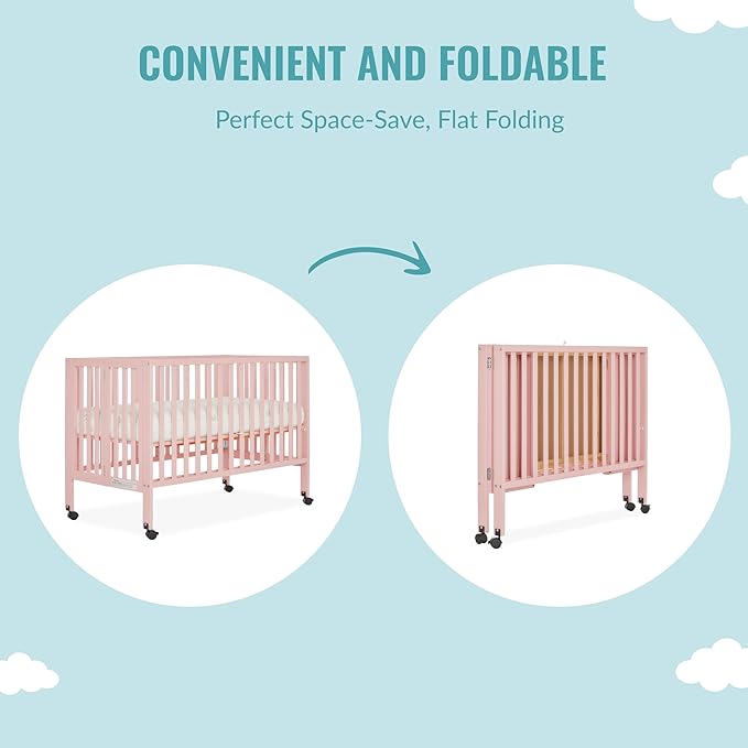 Quinn Full-Size Folding Crib in Blush Pink, Removeable Wheels, Modern Nursey, Adjustable Mattress Support, Portable Crib, Patented Folding System