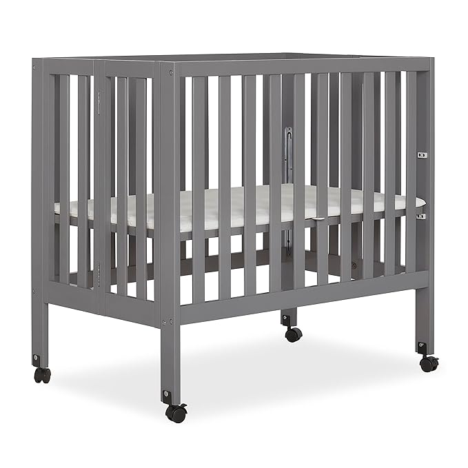 Jett Non-Full Size Folding Convertible Crib, Lightweight Portable Crib, Three Adjustable Mattress Height Settings, Easy to Fold Travel Crib, 1.5” Mattress Pad Included