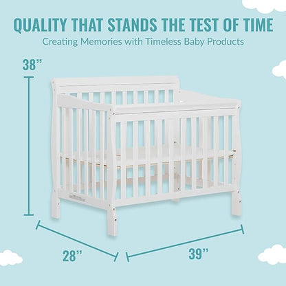 Aden 4-in-1 Convertible Mini Crib In White, Greenguard Gold Certified, Non-Toxic Finish, New Zealand Pinewood, With 3 Mattress Height Settings