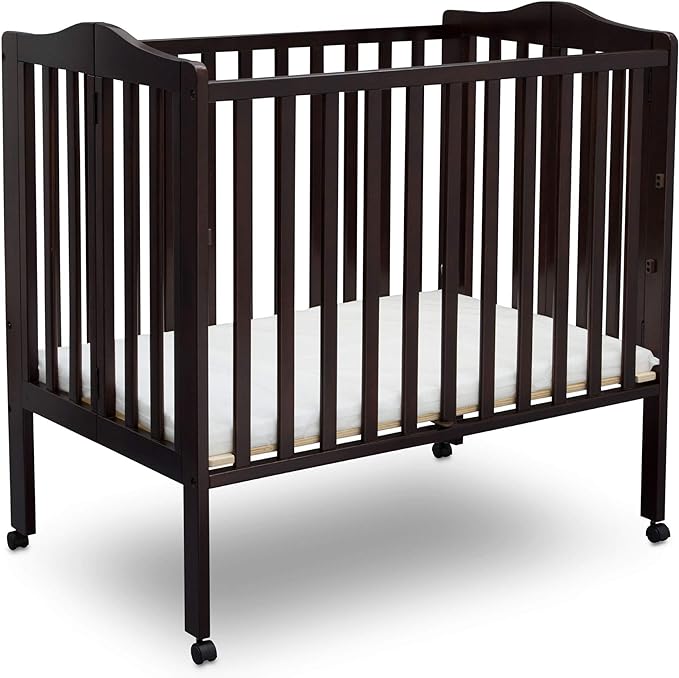 Delta Children Folding Portable Mini Baby Crib with 1.5-inch Mattress, Dark Chocolate