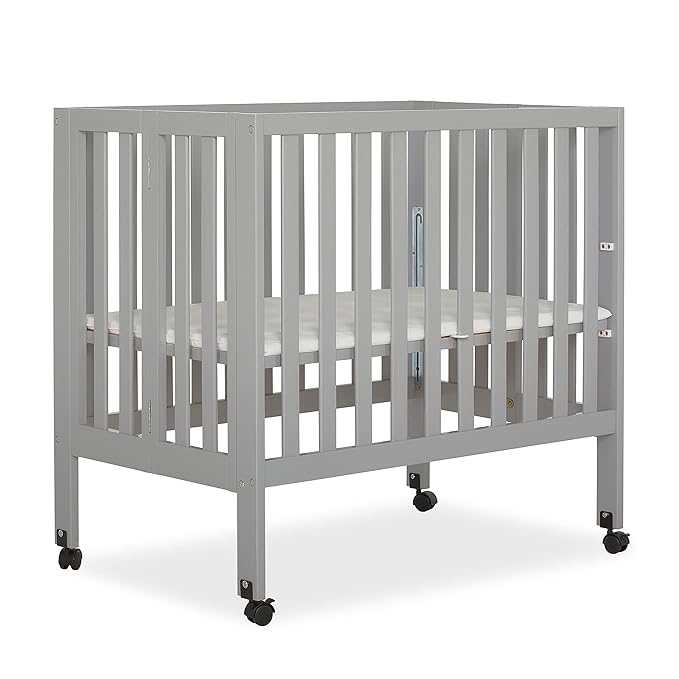 Jett Non-Full Size Folding Convertible Crib, Lightweight Portable Crib, Three Adjustable Mattress Height Settings, Easy to Fold Travel Crib, 1.5” Mattress Pad Included