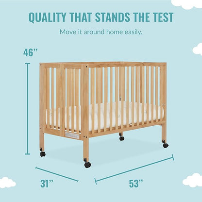 Quinn Full-Size Folding Crib in Natural, Removeable Wheels, Modern Nursey, Adjustable Mattress Support, Portable Crib, Patented Folding System