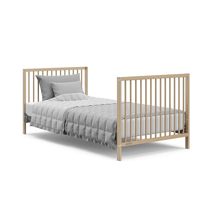 Graco Teddi 4-in-1 Convertible Mini Crib with Bonus Water-Resistant Mattress (Driftwood) – GREENGUARD Gold Certified, 2.75-Inch Mattress Included, Convenient Size, Easy 30-Minute Assembly