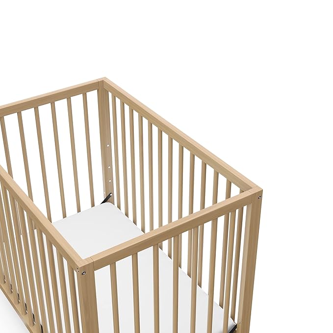 Graco Teddi 4-in-1 Convertible Mini Crib with Bonus Water-Resistant Mattress (Driftwood) – GREENGUARD Gold Certified, 2.75-Inch Mattress Included, Convenient Size, Easy 30-Minute Assembly
