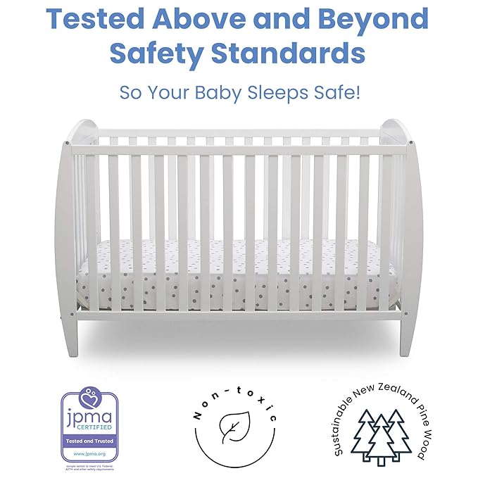 Delta Children Twinkle 4-in-1 Convertible Baby Crib, Sustainable New Zealand Wood, White and Delta Children Twinkle Galaxy Dual Sided Recycled Fiber Core Crib and Toddler Mattress (Bundle)