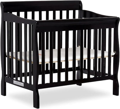 Aden 4-in-1 Convertible Mini Crib In Black, Greenguard Gold Certified, Non-Toxic Finish, New Zealand Pinewood, With 3 Mattress Height Settings