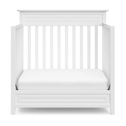 Storkcraft Petal 4-in-1 Convertible Mini Crib (White) – GREENGUARD Gold Certified, Converts to Daybed and Twin-Size Bed, Includes Bonus 2.75-inch Mini Crib Mattress, Mini Crib with Mattress Included