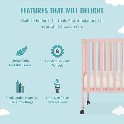 Quinn Full-Size Folding Crib in Blush Pink, Removeable Wheels, Modern Nursey, Adjustable Mattress Support, Portable Crib, Patented Folding System