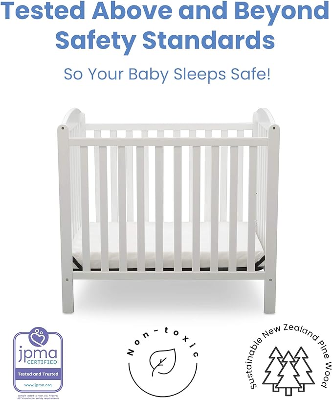 Delta Children Emery Mini Convertible Baby Crib with 2.75-inch Mattress, Bianca White