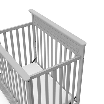 STORKCRAFT Petal 4-in-1 Convertible Mini Crib (Pebble Gray) – GREENGUARD Gold Certified, Converts to Daybed and Twin-Size Bed, Includes Bonus 2.75-inch Mini Crib Mattress