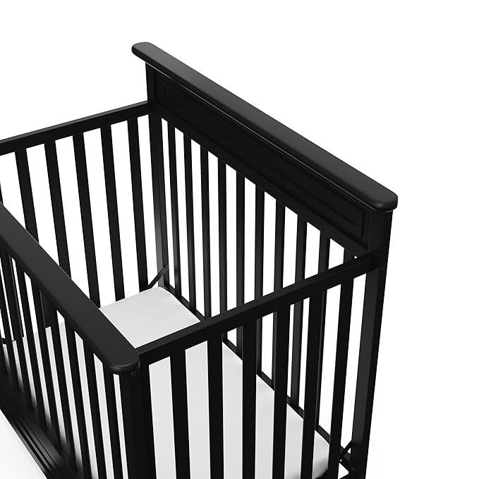 Storkcraft Petal 4-in-1 Convertible Mini Crib (Black) – GREENGUARD Gold Certified, Converts to Daybed and Twin-Size Bed, includes Bonus 2.75-inch Mini Crib Mattress