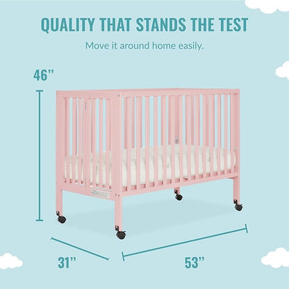 Quinn Full-Size Folding Crib in Blush Pink, Removeable Wheels, Modern Nursey, Adjustable Mattress Support, Portable Crib, Patented Folding System