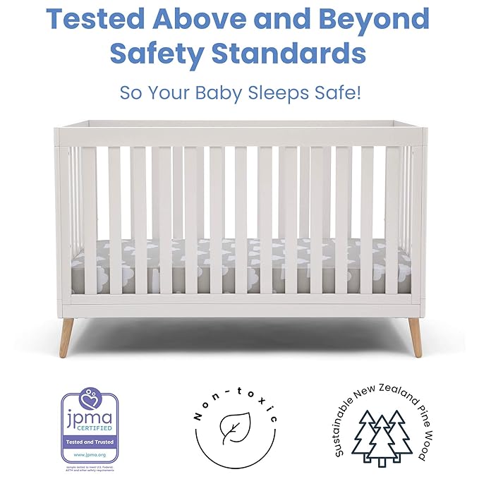 Delta Children Essex 4-in-1 Convertible Baby Crib, Bianca White with Natural Legs + Delta Children Twinkle Galaxy Dual Sided Recycled Fiber Core Crib and Toddler Mattress (Bundle)