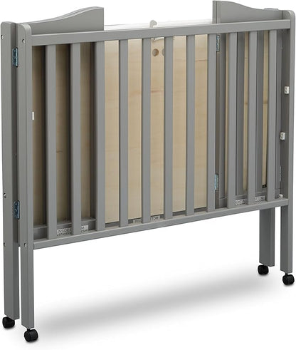 Delta Children Folding Portable Mini Baby Crib with 1.5-inch Mattress - Greenguard Gold Certified, Grey