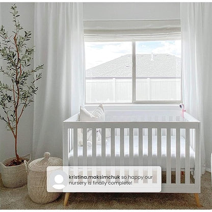 Delta Children Essex 4-in-1 Convertible Baby Crib, Bianca White with Natural Legs