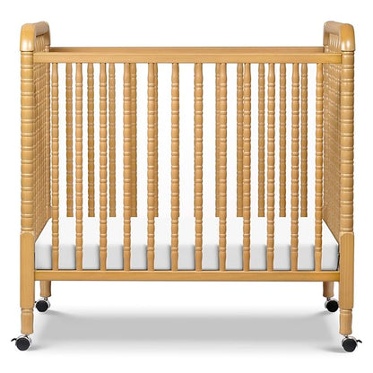 DaVinci Jenny Lind 3-in-1 Convertible Mini Crib in Honey, Removable Wheels, Greenguard Gold Certified