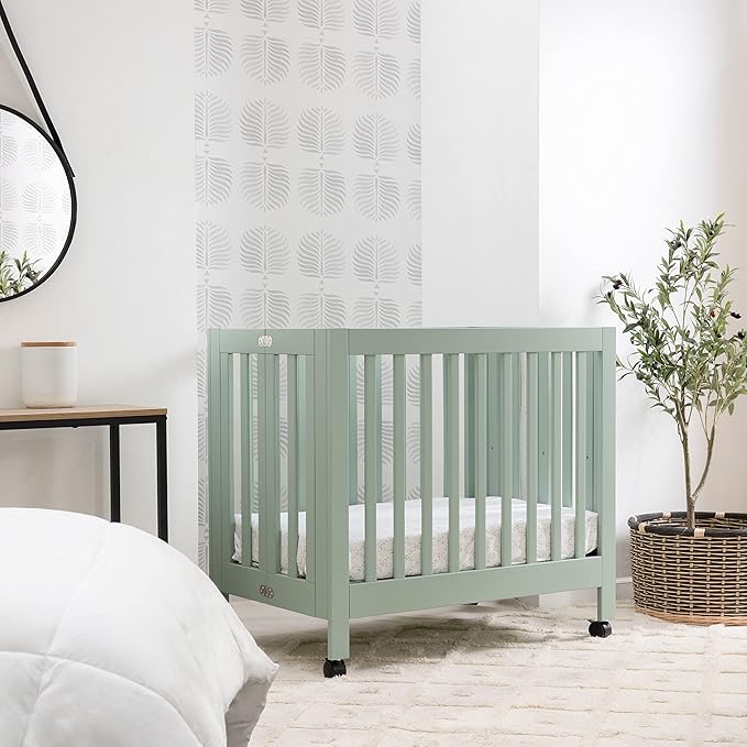 Babyletto Origami Mini Portable Crib Folding with Wheels in Light Sage, 2 Adjustable Mattress Positions, Greenguard Gold Certified