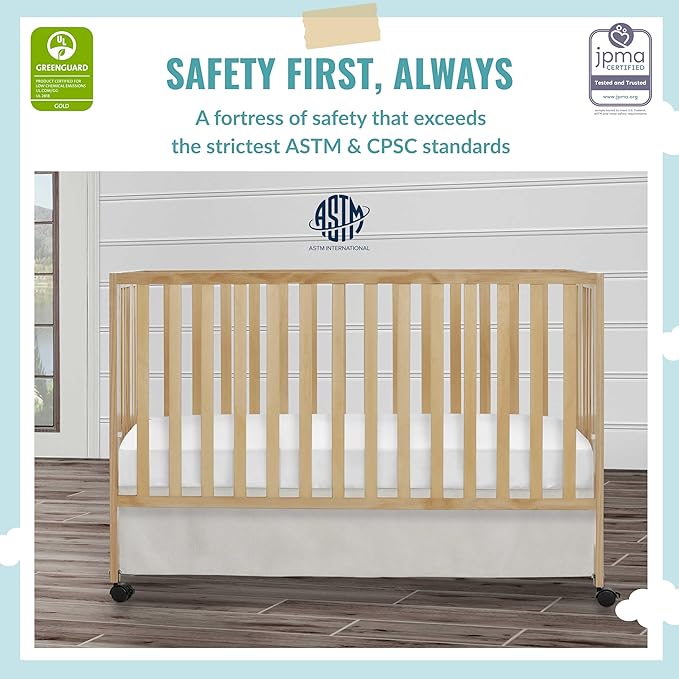 Quinn Full-Size Folding Crib in Natural, Removeable Wheels, Modern Nursey, Adjustable Mattress Support, Portable Crib, Patented Folding System