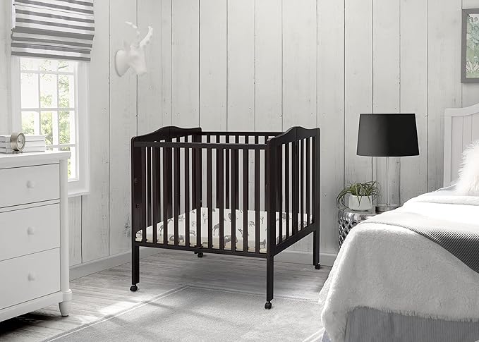 Delta Children Folding Portable Mini Baby Crib with 1.5-inch Mattress, Dark Chocolate