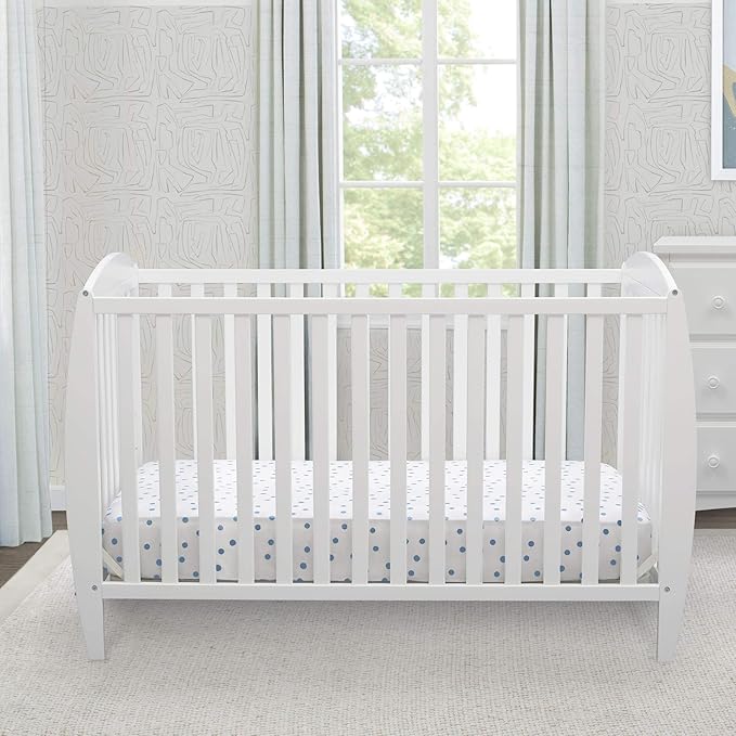 Delta Children Taylor 4-in-1 Convertible Baby Crib, Easy to Assemble, Sustainable New Zealand Wood, JPMA Certified, White