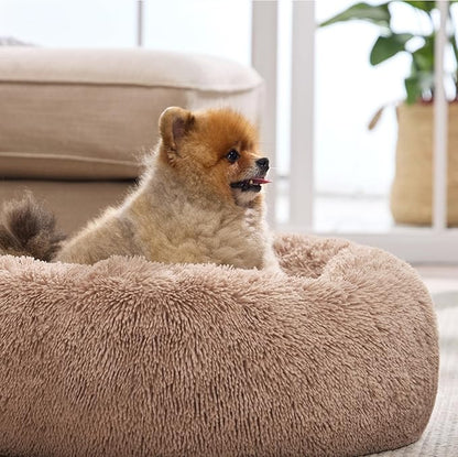 Bedsure Calming Dog Bed for Small Medium Dogs - Donut Washable Medium Pet Bed, 27 inches Anti-Slip Round Fluffy Plush Faux Fur Cat Bed, Camel