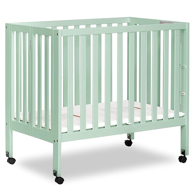 Jett Non-Full Size Folding Convertible Crib, Lightweight Portable Crib, Three Adjustable Mattress Height Settings, Easy to Fold Travel Crib, 1.5” Mattress Pad Included