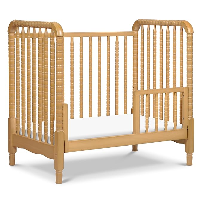 DaVinci Jenny Lind 3-in-1 Convertible Mini Crib in Honey, Removable Wheels, Greenguard Gold Certified