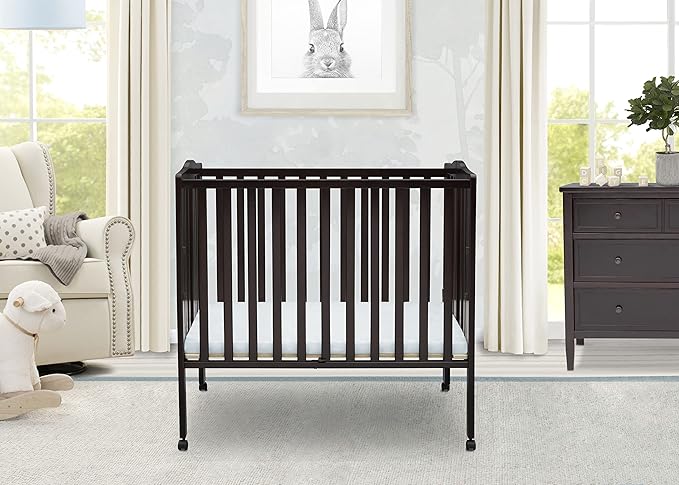 Delta Children Folding Portable Mini Baby Crib with 1.5-inch Mattress, Dark Chocolate