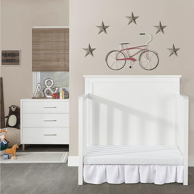 Ava 4-in-1 Convertible Mini Crib in White, Greenguard Gold Certified, Non-Toxic Finish, Comes with 1" Mattress Pad, with 3 Mattress Height Settings