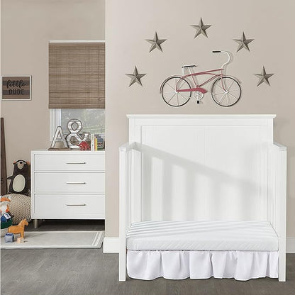 Ava 4-in-1 Convertible Mini Crib in White, Greenguard Gold Certified, Non-Toxic Finish, Comes with 1" Mattress Pad, with 3 Mattress Height Settings