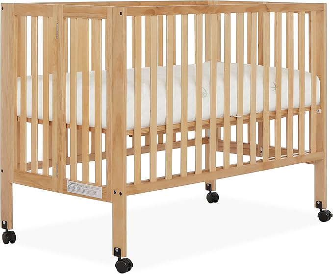 Quinn Full-Size Folding Crib in Natural, Removeable Wheels, Modern Nursey, Adjustable Mattress Support, Portable Crib, Patented Folding System