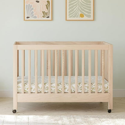 Babyletto Maki Full-Size 2-in-1 Portable Folding Crib with Toddler Bed Conversion Kit in Washed Natural, Greenguard Gold Certified