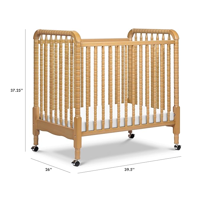 DaVinci Jenny Lind 3-in-1 Convertible Mini Crib in Honey, Removable Wheels, Greenguard Gold Certified