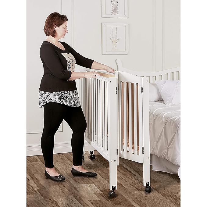 3 in 1 Portable Folding Stationary Side Crib in White, Greenguard Gold Certified, Safety Wheel with Locking Casters, Convertible, 3 Mattress Heights