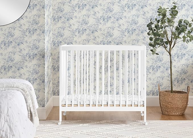 Delta Children Mia Portable Folding Mini Crib with 1.5-Inch Mattress - Greenguard Gold Certified, Bianca White